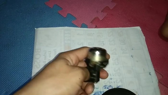 Carefully open the bell mechanism. Note that this particular bell doesn't have screws, it may need to be pulled apart.