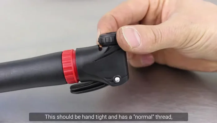 Remove the plastic piece inside the pump head.