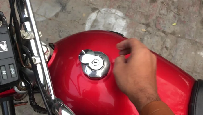 Identify the problem: The fuel tank cap is difficult to open or close.