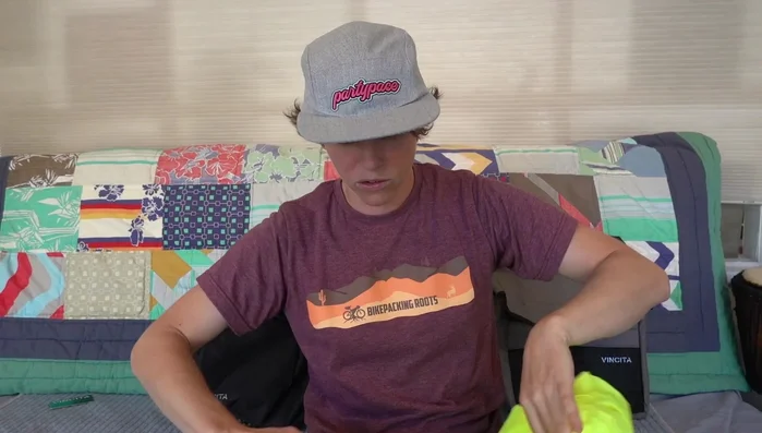 Testing water resistance with the included rain covers under a simulated rainfall.