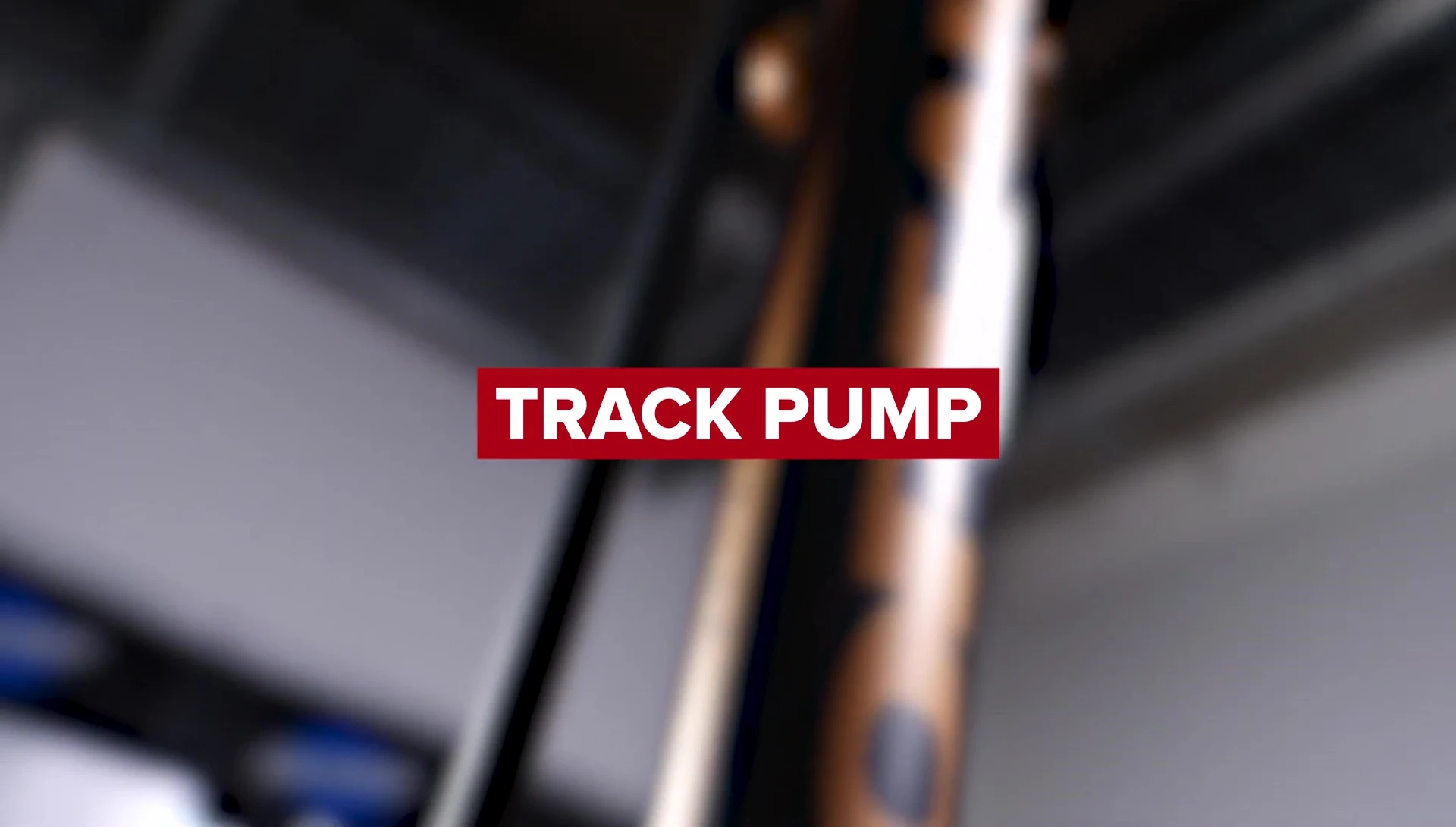 A high-quality track pump with a clear pressure gauge.