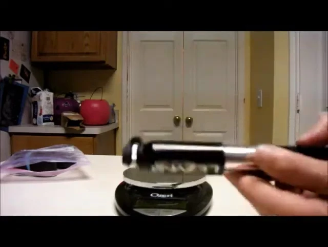 The speaker measuring the length of the pump