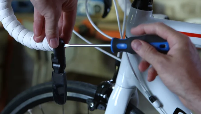Adequate tightening will maintain the mirror's position. You can flip it under the handlebars if needed.