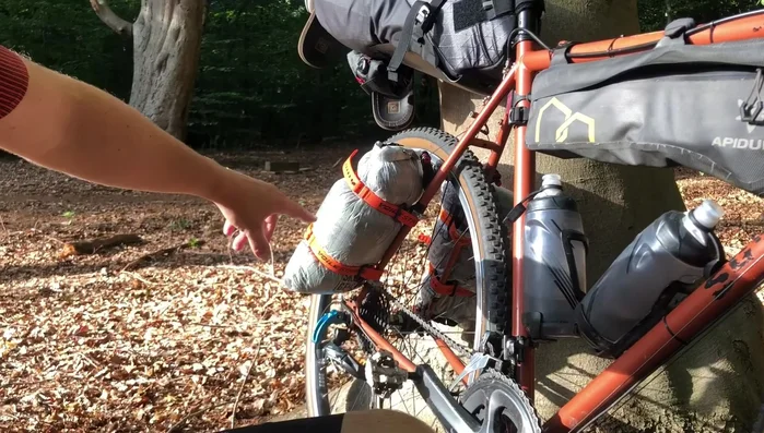 Distribute your gear efficiently among the dry bags. Prioritize weight distribution for balance.