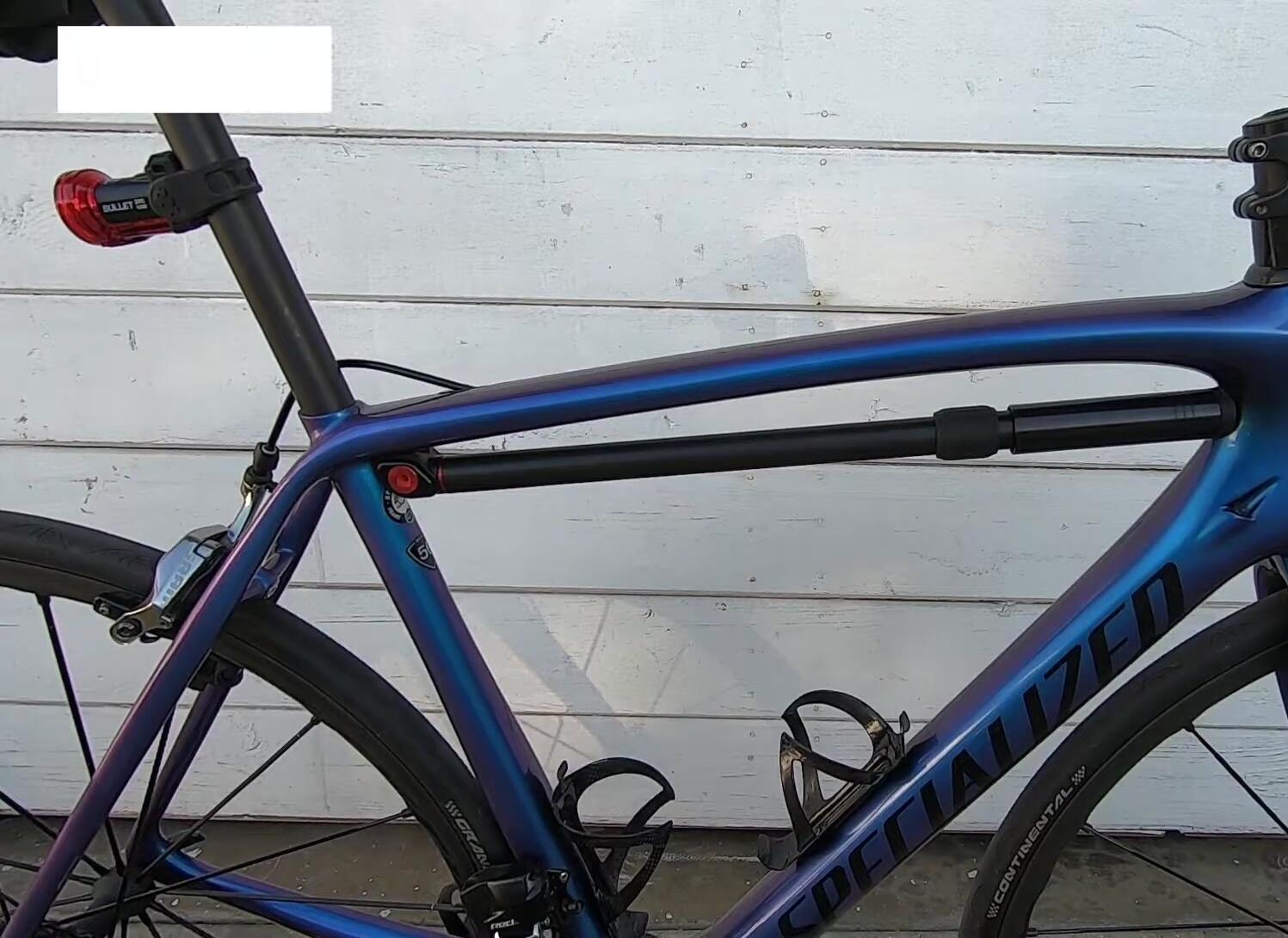 The pump mounted on a bicycle frame