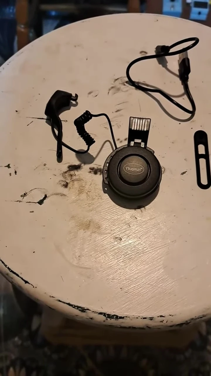 Close-up of the Ytuomzi bike bell packaging and price tag.