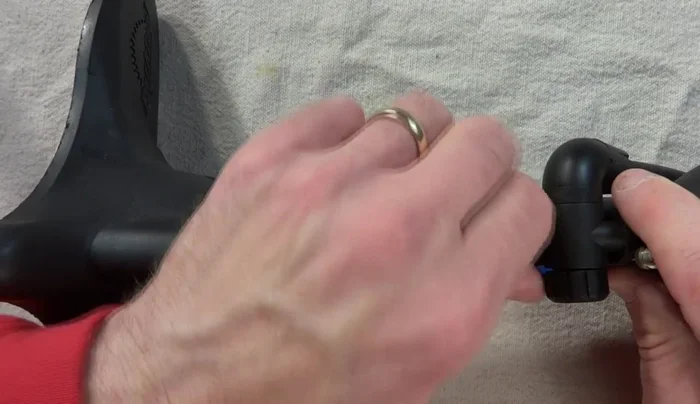 Inspect and replace the O-ring in the hose base if necessary.