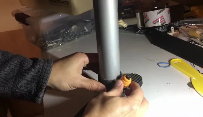 Remove the small cap at the end of the tube assembly.