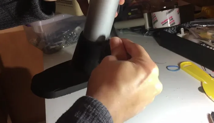 Remove the small cap at the end of the tube assembly.