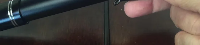 Unscrew the top unit of the bike pump and keep the cap.