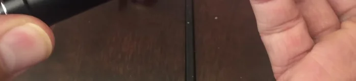 Remove the valve adapter from inside the pump. This is the small piece that allows you to switch between Presta and Schrader.