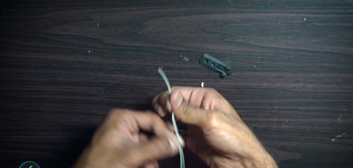 Secure the second cable tie where the first one loops around, leaving a small gap.