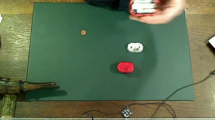 Use a flathead screwdriver to gently pry out the old batteries.