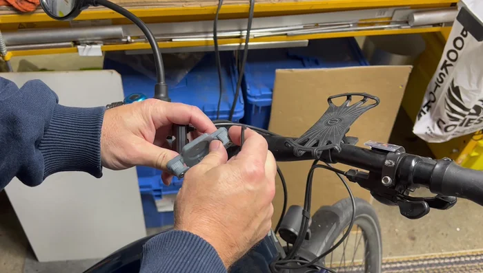 Install the replacement part onto the bike computer and test its functionality.