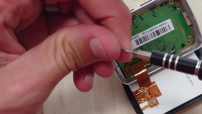 Secure the motherboard with the four screws.