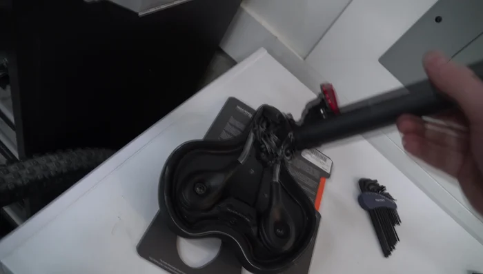 Attach the new seat to the rails and tighten the screws. 