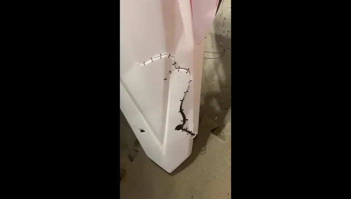 Drill small holes at the end of the cracks to prevent further cracking.