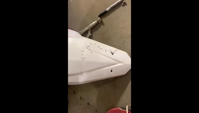 Drill small holes at the end of the cracks to prevent further cracking.