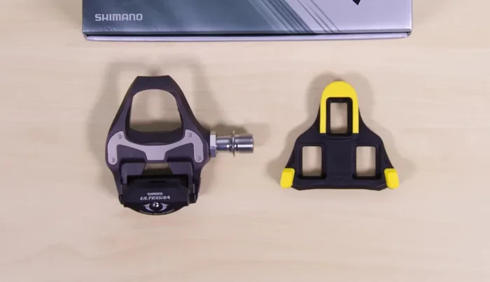 Choose road pedals with a significantly larger plastic cleat for optimum pedaling efficiency.