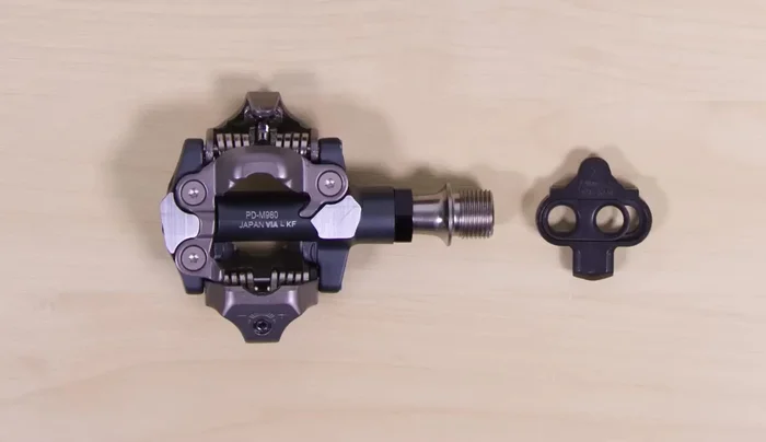 Choose mountain bike SPD pedals featuring a two-bolt cleat fitting for secure engagement and disengagement.