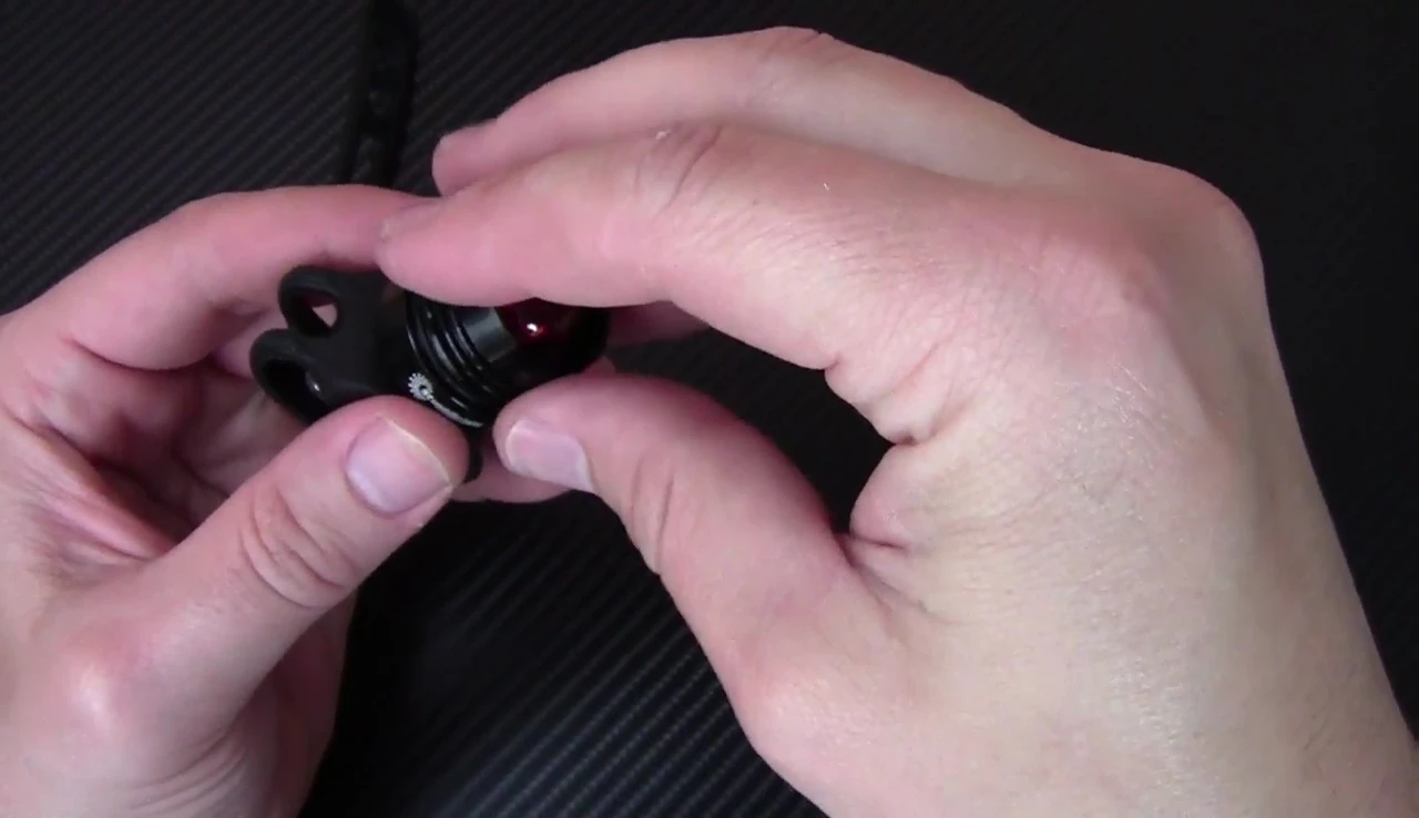 Detailed image demonstrating battery installation process.
