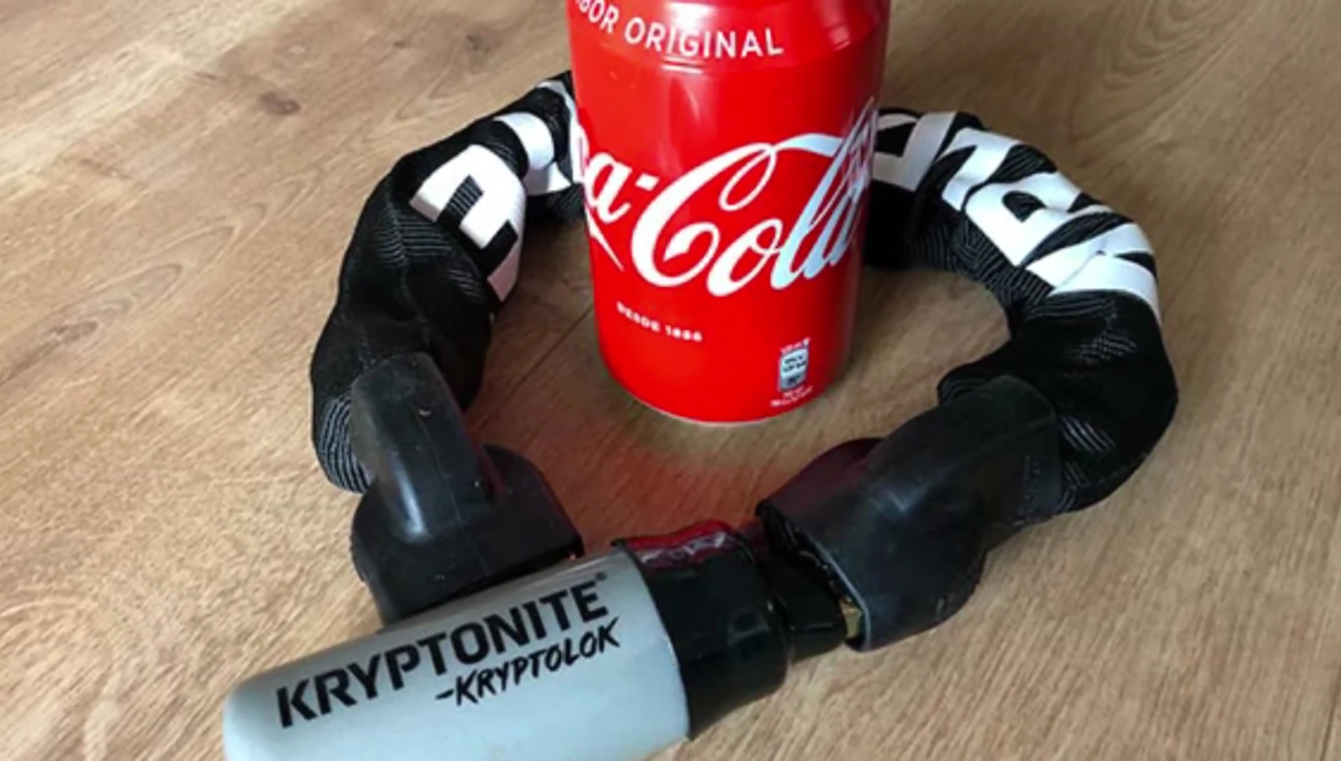 The chain lock wrapped around a bicycle's seat post.