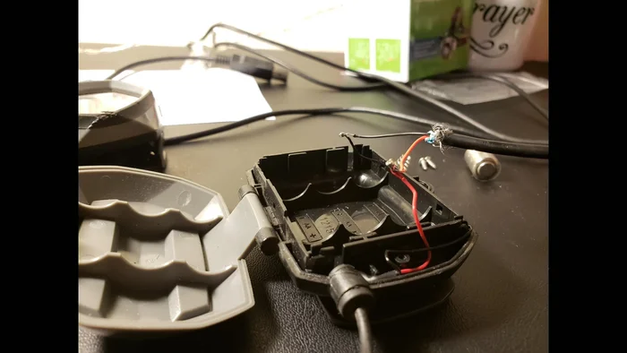 Solder the red wire from the microUSB cable to the red wire of the bike light and the black to black.