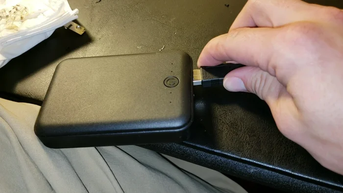 Test the modified light by connecting it to the power supply and turning it on.