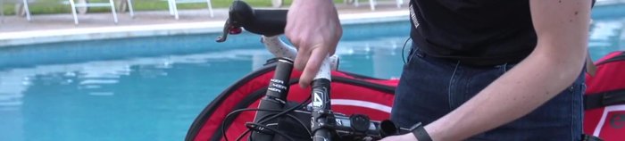 Protect the derailleur and chain with a chain protector (or use bubble wrap and cardboard).