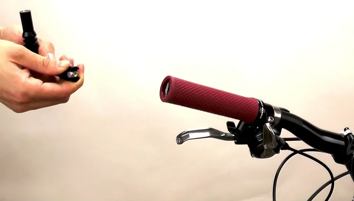 Use the included hex wrench to tighten the bolt until the mirror base is secured.