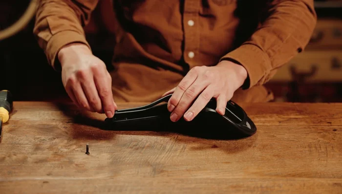 Close down the nose piece and tighten the bolt while holding the nose of your saddle.
