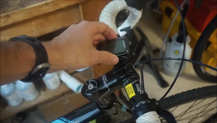 Attach the head unit to the mount using cable ties or an O-ring, ensuring it doesn't interfere with cables or hand position.