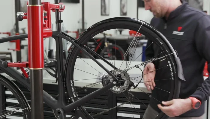 Ensure fender placement doesn't interfere with wheel travel, brake function, or other bike parts.