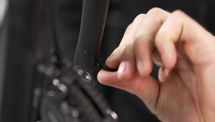 Tighten the eye bolts locking nuts using the 8mm open-end wrench.