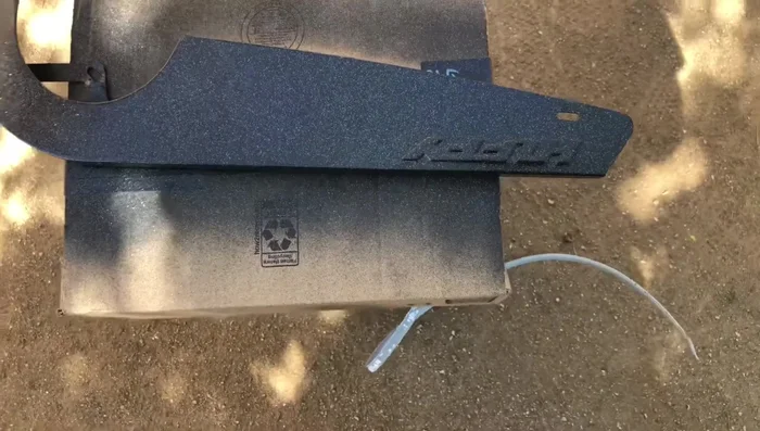 Apply multiple coats of clear coat spray paint (3-4 coats recommended) for protection and shine. Wet sanding and buffing may be needed after clear coat application for a smooth finish.