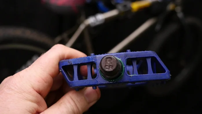 Reinstall the pedals onto the bike.