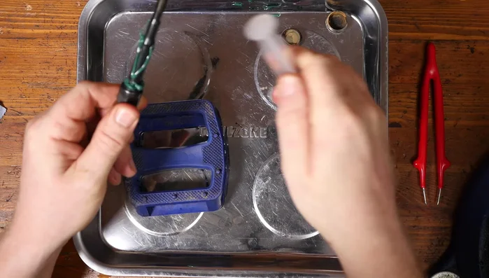 Insert the axle through the bearings.