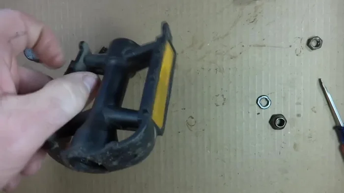 Install the new bearings into both sides of the pedal. The number of bearings may vary slightly, aim for a continuous ring.