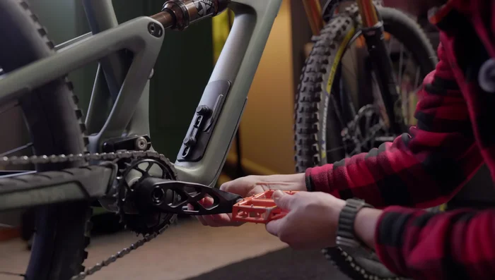 Thread the pedal onto the crank, turning the wrench towards the front of the bike to tighten. Don't overtighten.