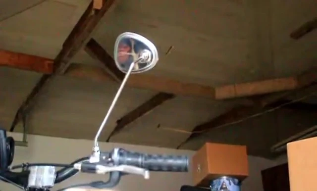 The reviewer expressing satisfaction with the installed mirror