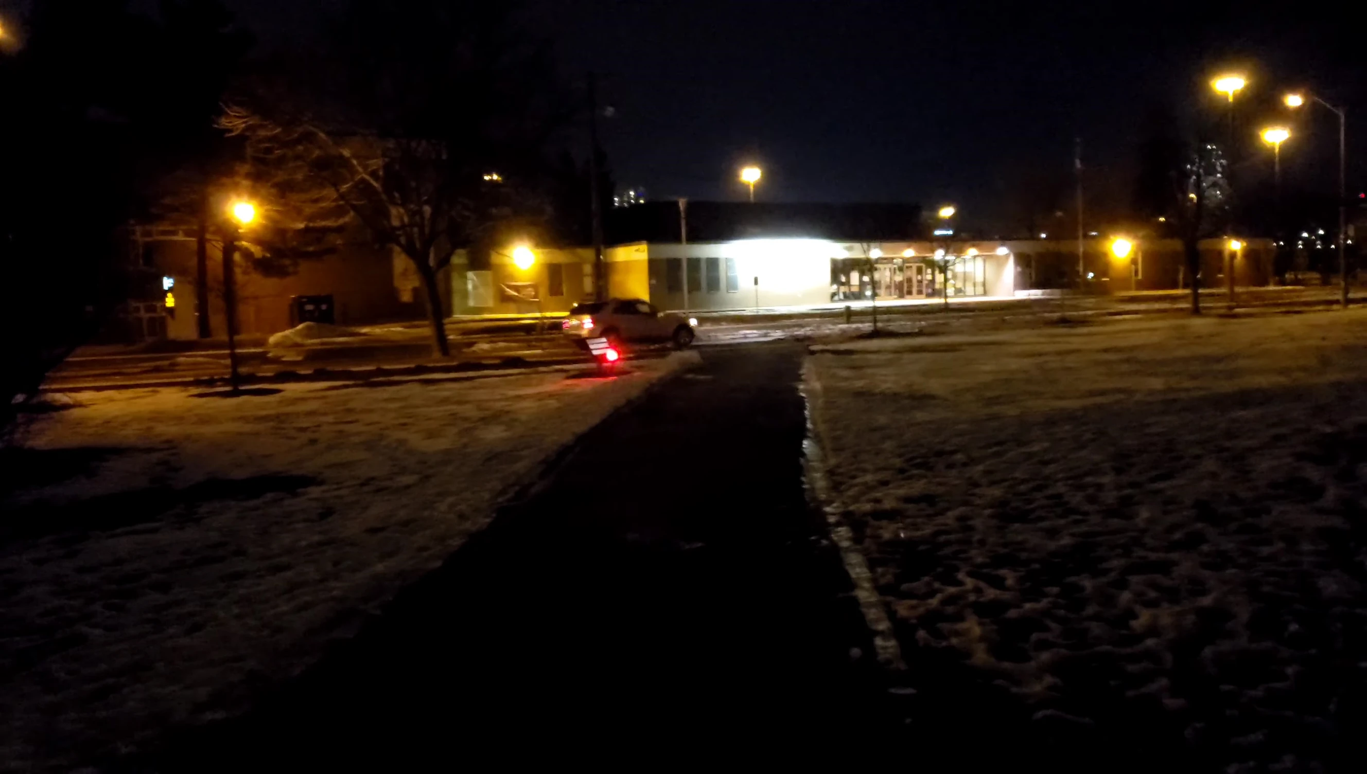 The flickering bike light visible from eight car lengths.