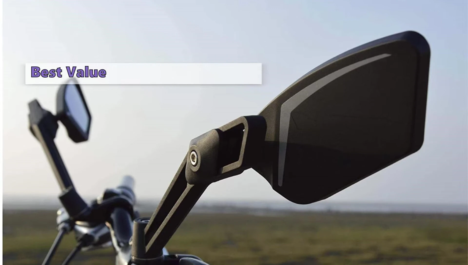 The mirror mounted on a bicycle handlebar, showcasing its unique shape.