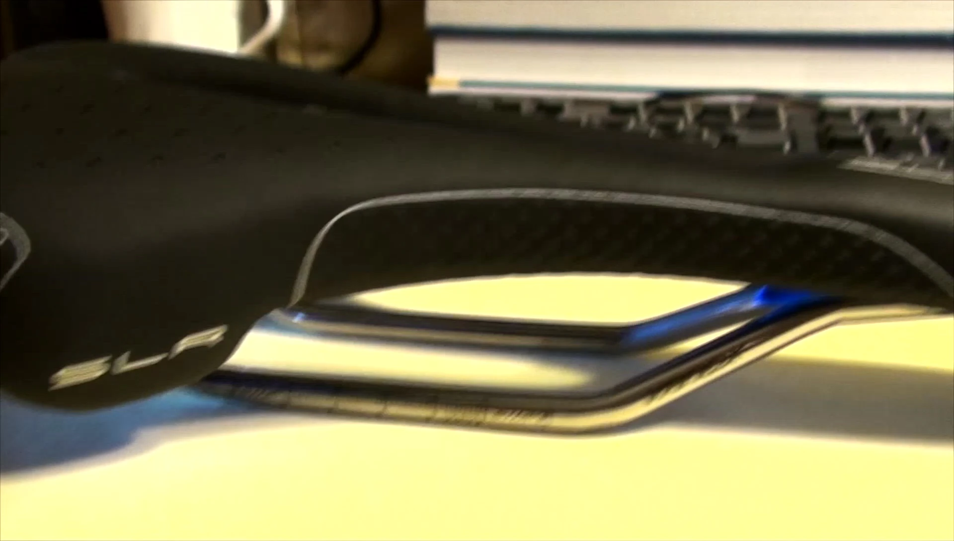 Close-up of the saddle rails, showing the 'Fox' markings.