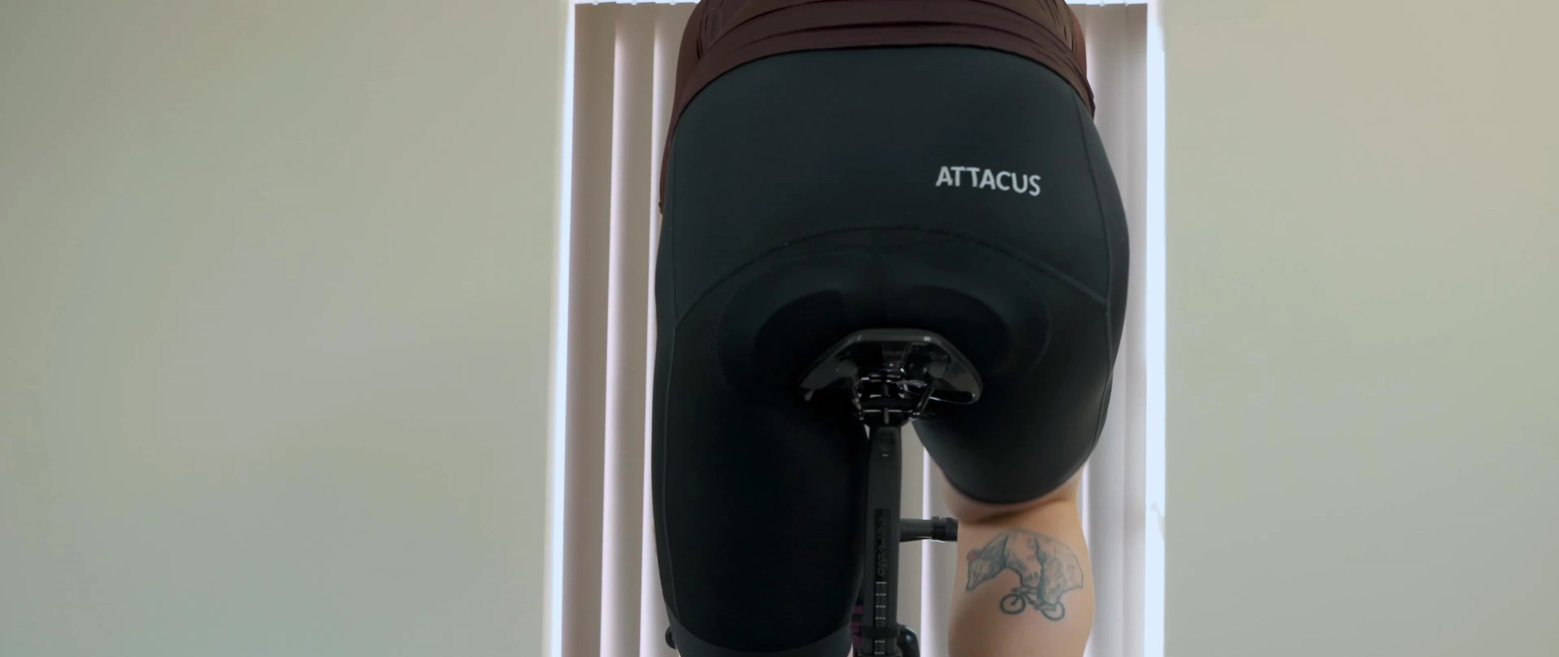 Footage of a cyclist pedaling, showing an example of incorrect saddle height
