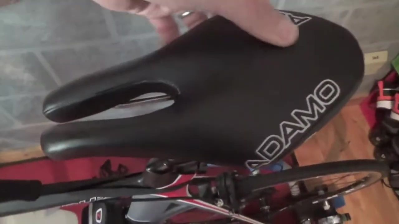 Close-up shot of the saddle showcasing the leather and stitching.
