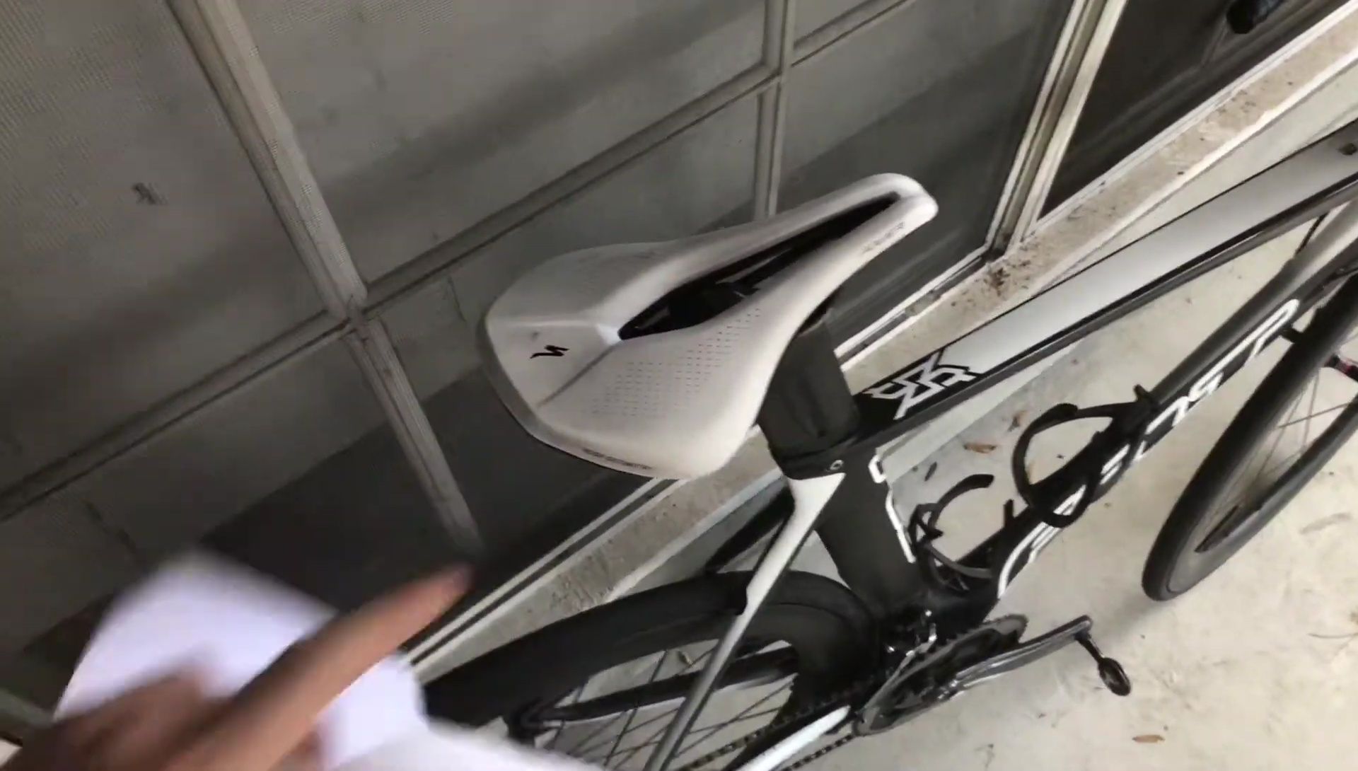 The rider showing the low stack height of the saddle on the bike.