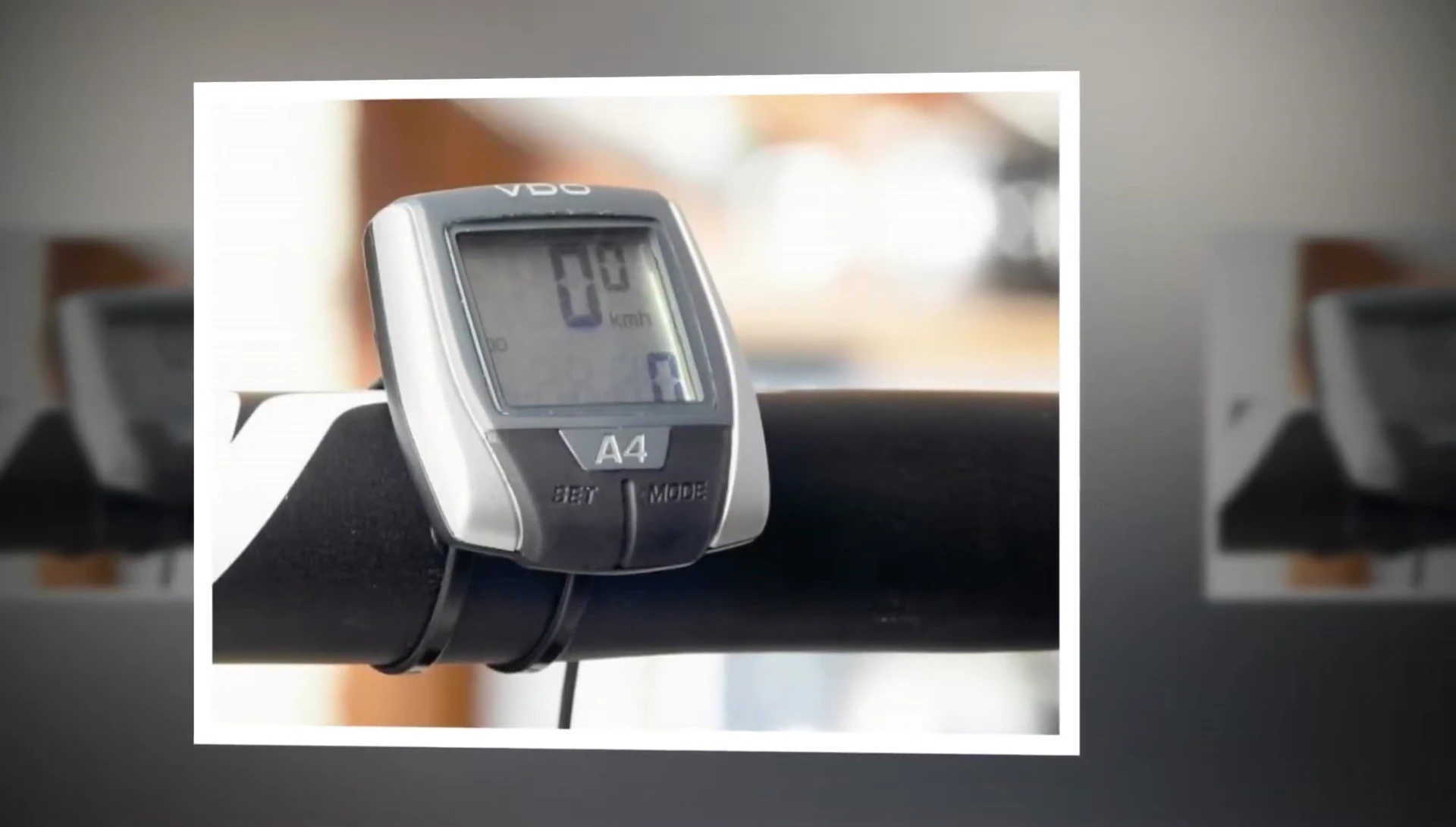 The VDO A4+ displayed alongside other cycling accessories