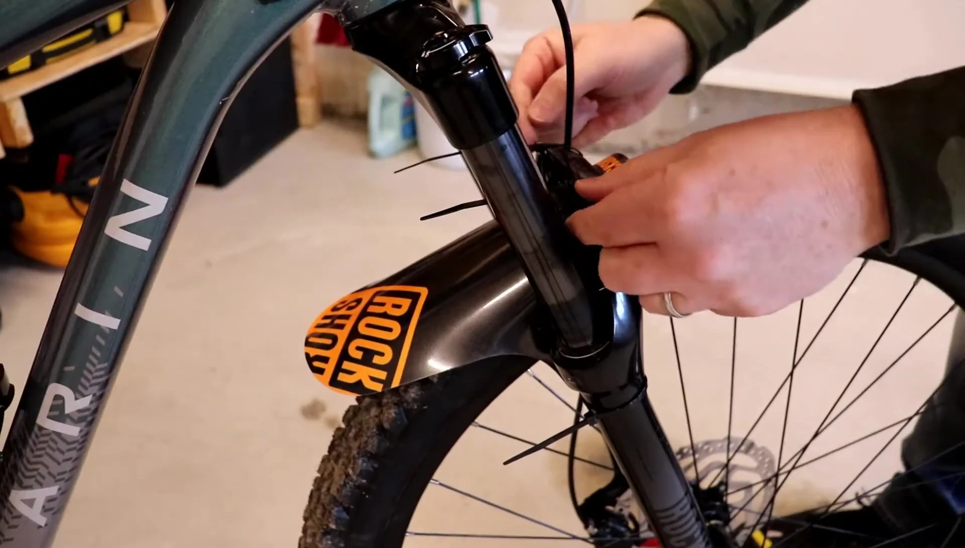 The installed fender, centered above the tire.