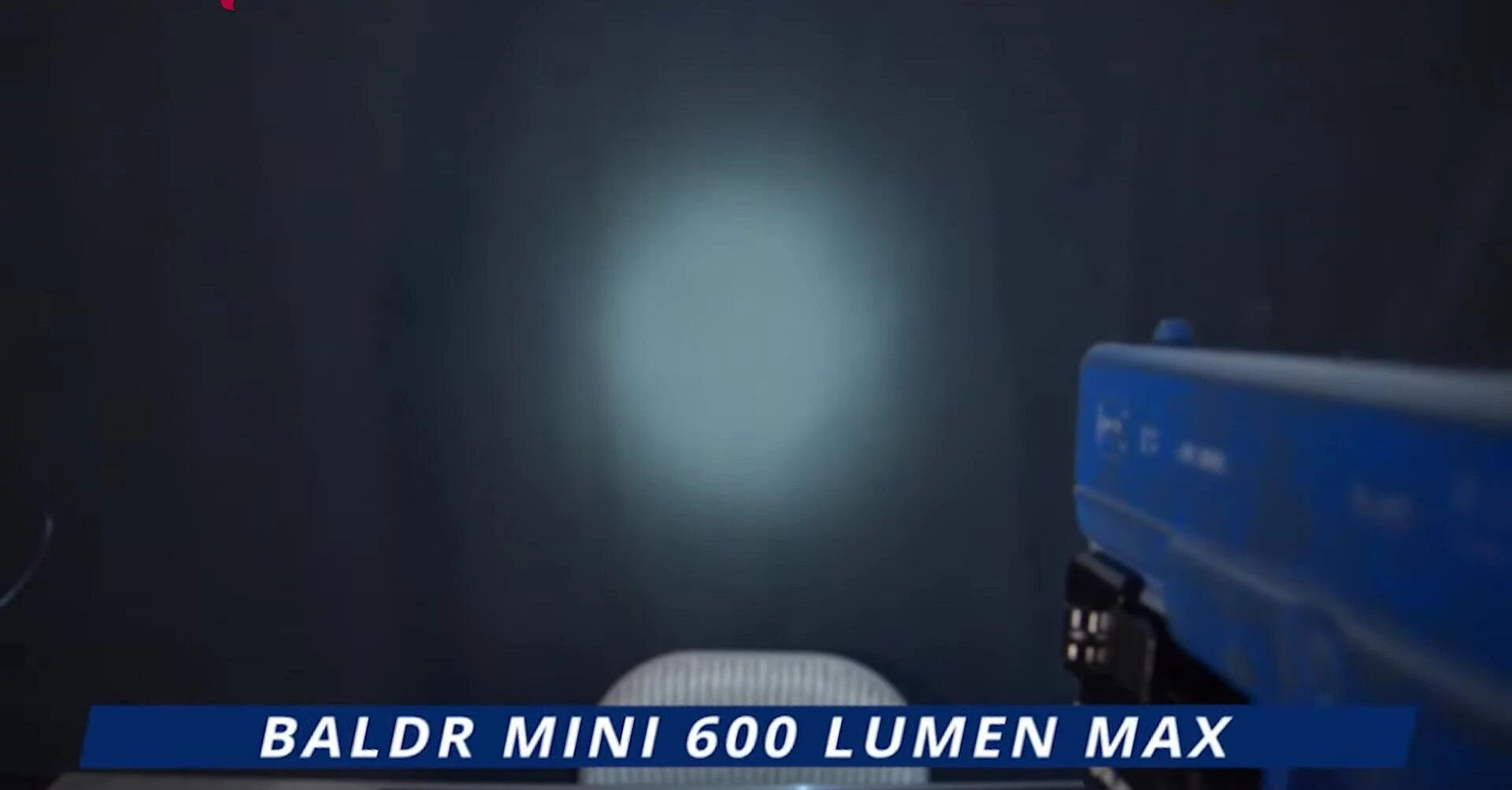 A shot demonstrating the Baldr Mini's light output