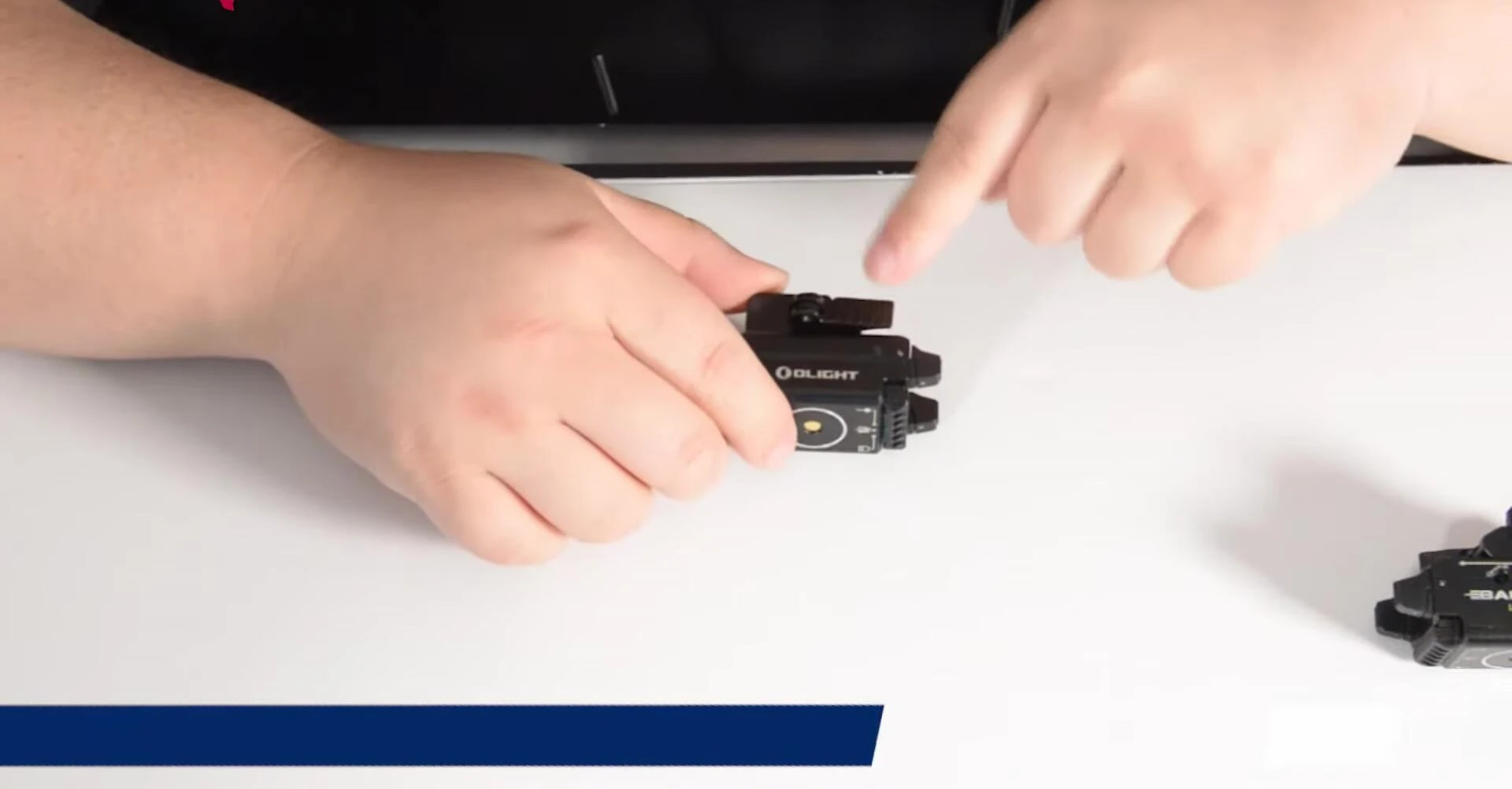 Demonstrating the quick-detach lever mechanism.